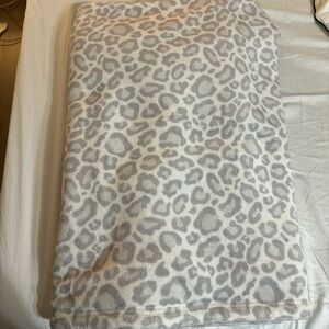 Society6 grey and White Leopard print sherpa fleece Cozy throw blanket